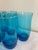 Set of six vintage aqua blue drinking glasses with a darker blue base. These retro tumblers have a clean, timeless shape...