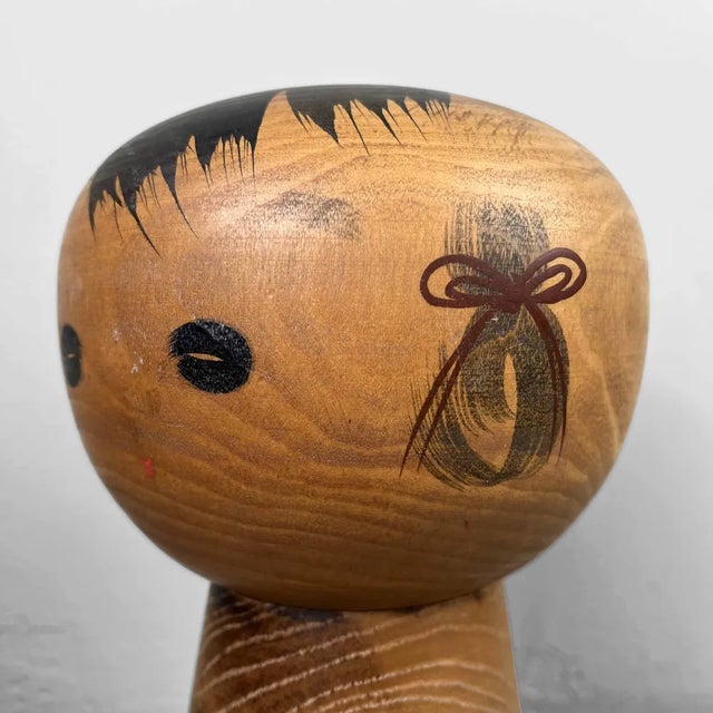 Dimensions: height 28 cm, diameter 15 cm. Kokeshi (こけし), are simple wooden Japanese dolls with no arms or legs that have...