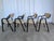 These vintage dining chairs were made back in the 1970s in former Yugoslavia. They are made from black wooden base in mid-...
