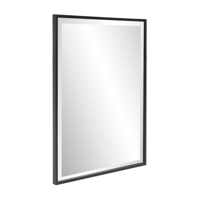Crafted with a sleek, powder-coated finish, this mirror with its matte black look complements a variety of design styles....