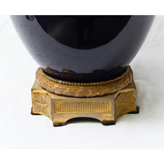 You are viewing a gorgeous pair of candelabra vases in the louis xvi manner main body of urn is blue porcelain offset by...