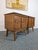 Stunning rare set of mid century modern nightstands by designer Leo Jiranek for Bassett. They feature 2 smooth gliding...