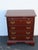 This classic Nightstand is made of wood, solid cherry, solid oak, and metal. The End Table was made by Kincaid Furniture...