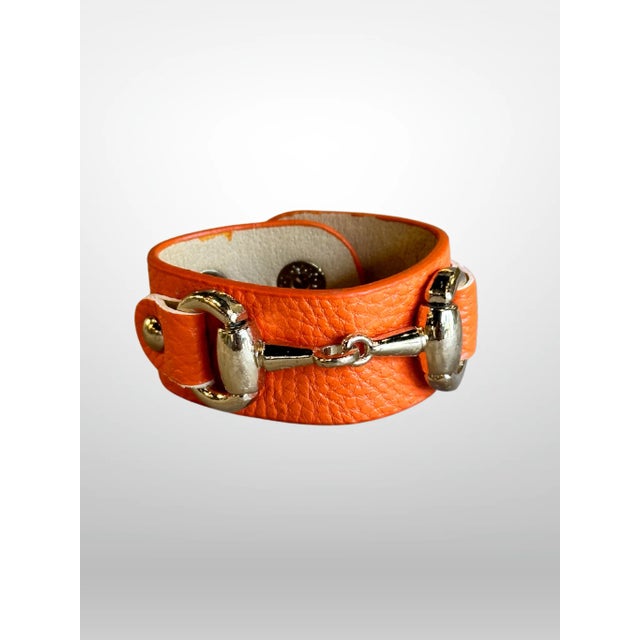 Beautiful set of 4 Orange Leather Horsebit Detail Napkin Rings. By NYC based Designer Julien Meija. Snap adjustable...