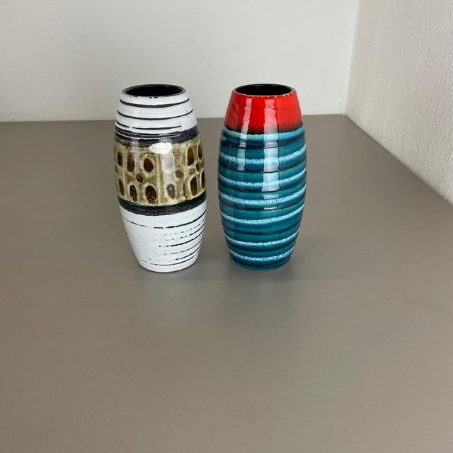 Article: Set of two fat lava art vases Producer: Scheurich, Germany Decade: 1950s These original vintage vases was...