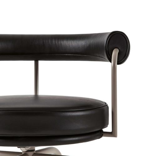 Black leather upholstered lc7 chair designed by charlotte perriand in 1927. Relaunched in 1978. Manufactured by cassina in...