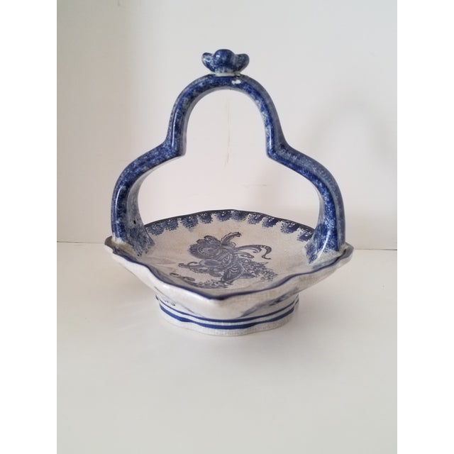 Vintage Baum Bros. Formalities blue and white hand painted crackled glass decorative basket. This is a beauty and will...