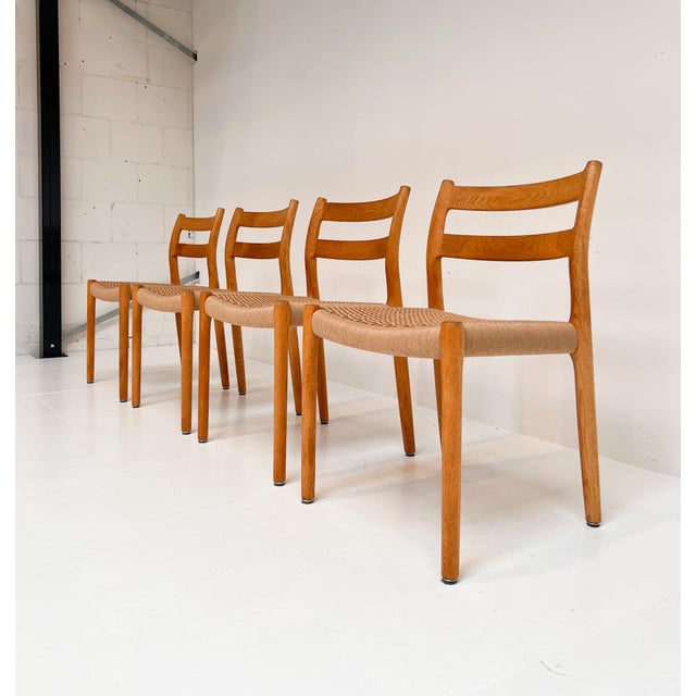 Timeless danish craftsmanship from the 1960s! a beautiful, elegant set of four oak model 84 chairs by niels otto møller....