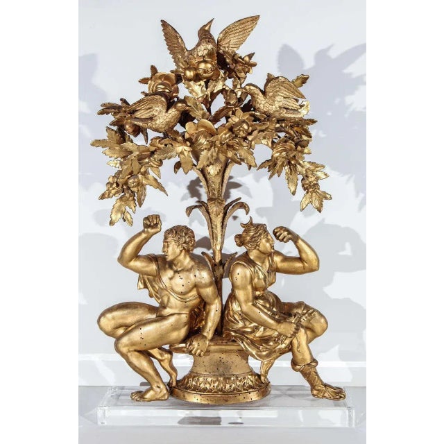 Hand carved and 22k, gold gilded, sculpture of the Tree of Life with figures mounted on a custom, Lucite base. Originally...
