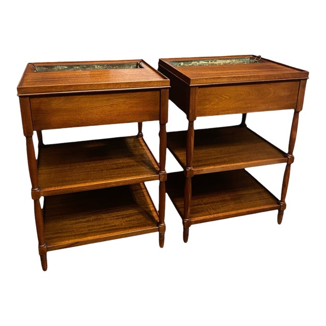 An unusual matched pair of early 20th-century Regency Revival side tables combining occasional-table functionality with...