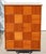 A striking combination of Mid-Century Modern design, warm teak craftsmanship, and ingenious hidden functionality, this...