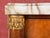 This antique c.1920's diminutive bowfront cabinet is a genuinely elegant small case piece, built around a burl veneered...