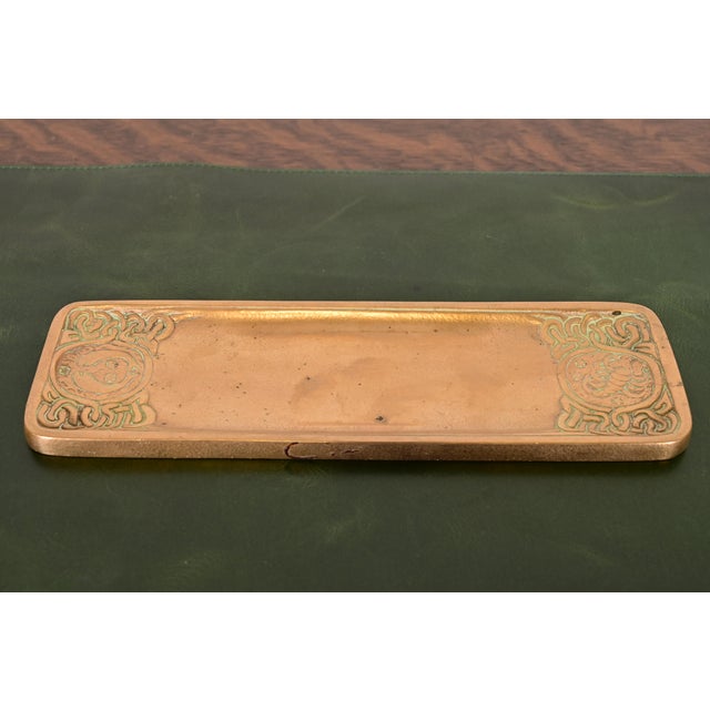 A gorgeous antique Art Deco or Arts & Crafts gilt bronze pen tray featuring Zodiac designs By Tiffany Studios (signed to...