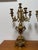 Elevate your interior with this impressive pair of French Rococo Revival gilt metal candelabra, each standing a commanding...