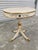 Decorative Florentine style handpainted drum table with gilded accents. This very sweet accent table features handpainted...