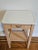 A charming and highly functional antique nightstand or bedside table, likely French or Continental in origin, dating to...