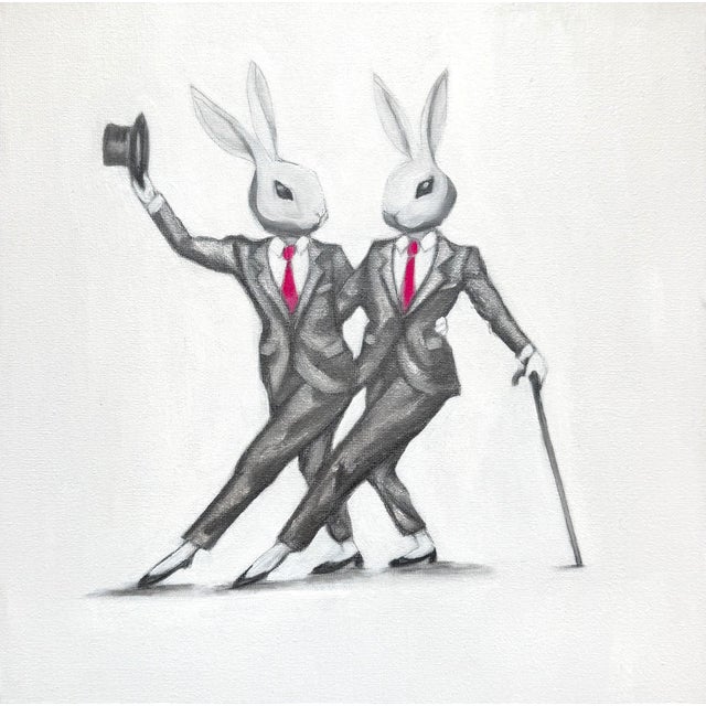 A Framed print of two dancing bunnies by Max & Alma. Max and Alma create kitsch, pop, feel-good art that elevates the vibe...