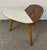 Add a touch of retro charm to your space with this eye-catching mid-century modern coffee table. Featuring a unique...