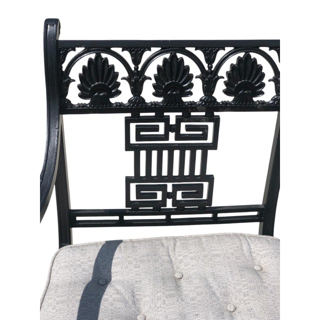 Pair of exquisite Late 19th Century Greek Revival Cast Iron Chairs. Heavy cast iron frame with Greek key decoration and...