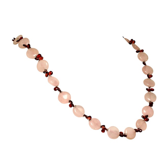 This is part of Chairish’s Fine Jewelry assortment. Elegant Garnet and Rose Quartz Necklace – 27 Inches of Sparkling...