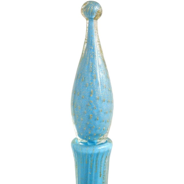 Beautiful and tall, vintage Murano hand blown sky blue, controlled bubbles and gold flecks Italian art glass decanter....