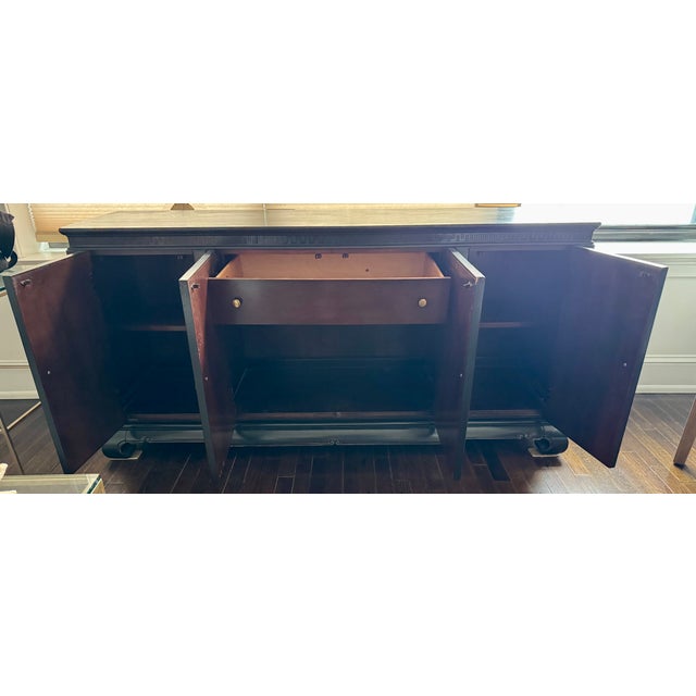Stunning 1960s Hollywood Regency / Chinoiserie ebonized black lacquer credenza by American of Martinsville. This...