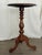 An antique English tripod table in mahogany, dating to the 19th century. Small pedestal tables like this were made...