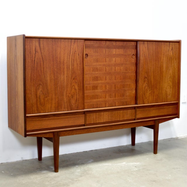Dimensions: 69 7/8” L x 18 1/2” D x 46 7/8” H Origin: Denmark Designer: Unknown Manufacturer: Unknown Year: 1960s...