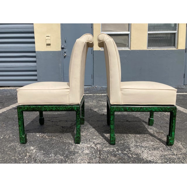 Pair of Faux Malachite Side Chairs, seats are vinyl. Good condition with some normal wear. No damages.