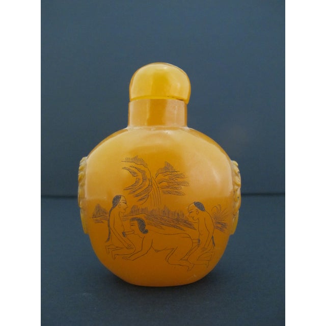 Chinese Erotic Orange Engraved Mock Mask Ring Handle Snuff Bottle For Sale - Image 4 of 11