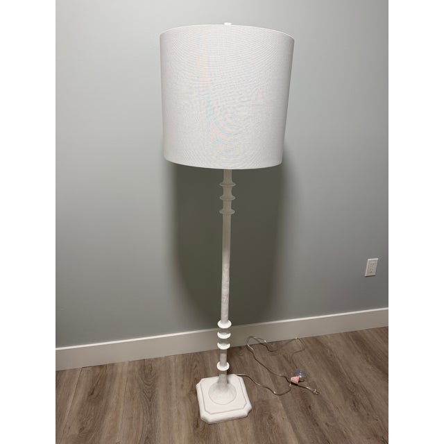 The Raziel Floor Lamp by Made Goods is a refined, sculptural lighting piece that reinterprets the classic spindle...