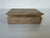 Beautiful vintage rectangular box crafted from solid travertine marble, featuring a warm earthy tone with natural porous...