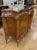 This 19th century Italian black walnut shaped front cabinet is a unique and stylish piece of furniture that would add a...