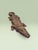 A monumental hand-carved solid wood alligator sculpture by acclaimed American chainsaw artist Ken Packie of Berkshire...