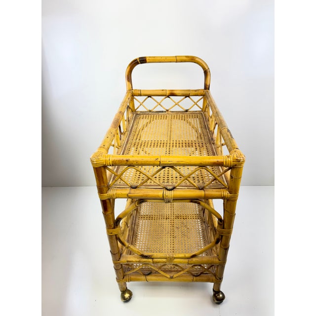 Vintage Bamboo and Cane Two-Tier Bar Cart With Brass Casters For Sale - Image 10 of 13