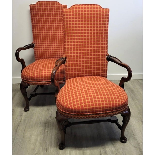 A refined pair of walnut armchairs by Century Furniture Company of Hickory, North Carolina, dating to the 1970s–1980s....