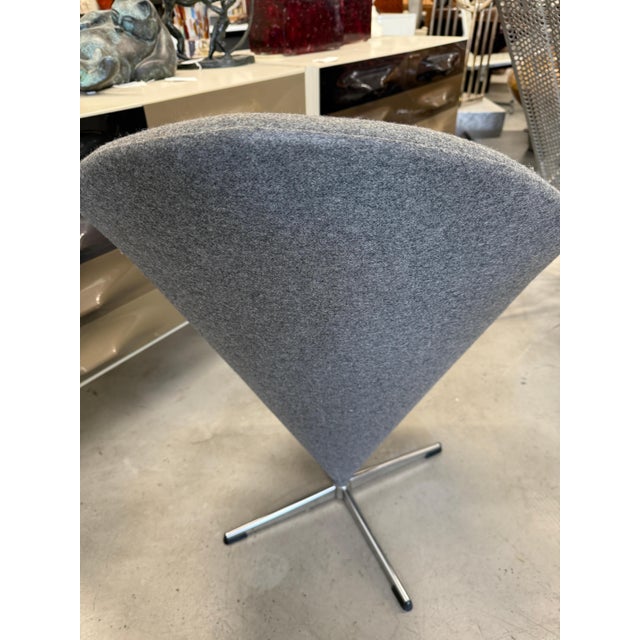 A wonderful pair of Verner Panton Cone Chairs re-upholstered in a beautiful wool gray felt. The chairs are very...