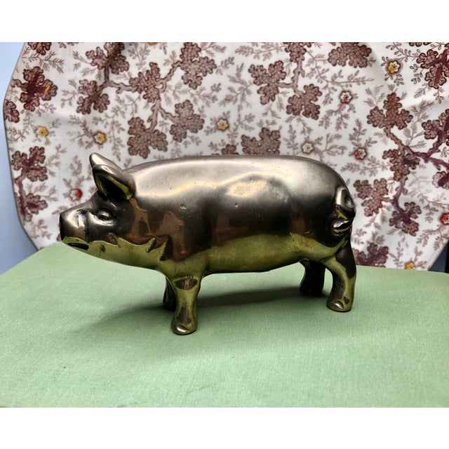 Whooooiiieee Pig! This solid brass pig figurine is adorable, from his inquisitive snout to a cute curly tail. It makes a...