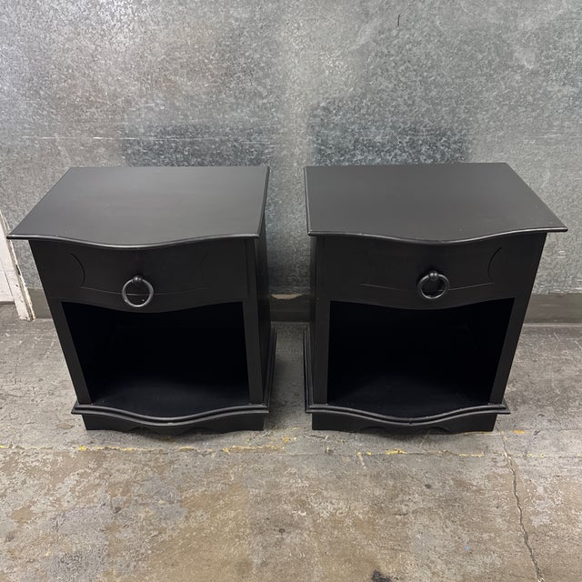 Design Plus Gallery presents a Pair of the 18th C. Black Baroque Curved Metal Nightstands from Restoration Hardware....