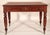 William IV mahogany writing table with a tooled leather top, circa 1835. With a rectangular top with rounded corners, an...