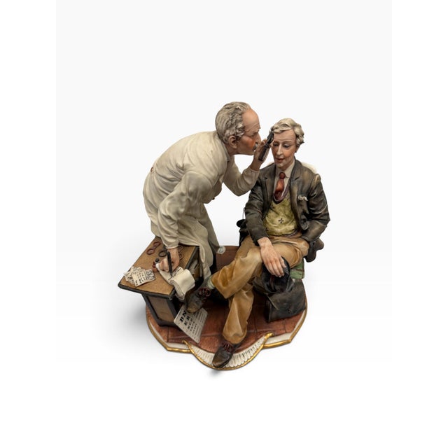 Presenting a masterpiece of traditional Italian narrative porcelain from the prestigious workshop of Porcellane Principe....