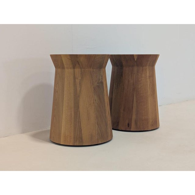 The Poliform Dama Side Table in Canaletto walnut embodies a sculptural simplicity that balances essential form with...