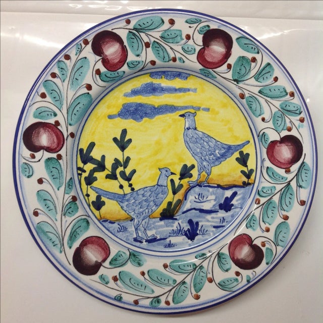 Pheasants and pomegranates hand painted in red, blue black, turquoise, and yellow. A terrific, colorful accent to any...