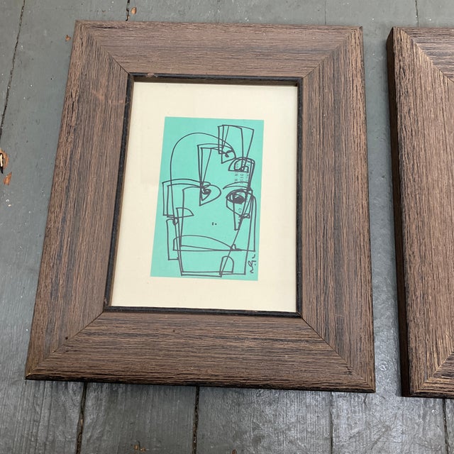 2 original 3 x 5 ink drawings done on vintage turquoise index cards both signed laid down on cream colored mat board...