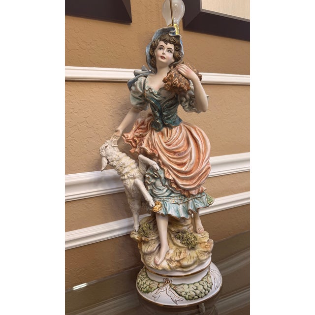 This beautiful Vintage Italian Capodimonte-style Hand Painted Porcelain Pheasant Lady with Lamb Figurine Lamp, features a...