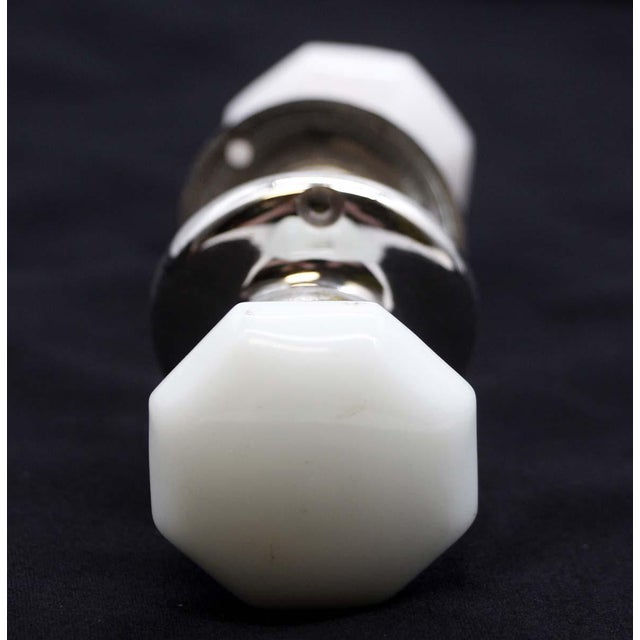 Vintage octagon shaped milk glass round front door knobs with polished nickel finish rosettes. Priced as two door knobs,...