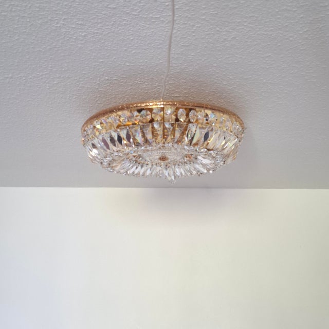 This stunning original ceiling lamp from the renowned design manufacturer Palwa (Palme & Walter) impresses with its...