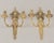 A pair of 19th Century Louis XVI style French bronze candle sconces, each with two scrolled arms and finely cast details....