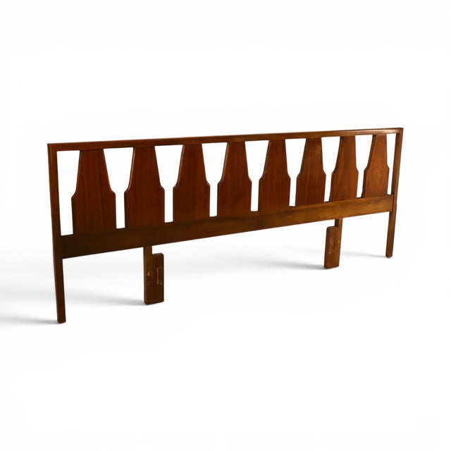 This 1960s Young Manufacturing king headboard shows the maker's sculptural instincts at architectural scale. A row of...