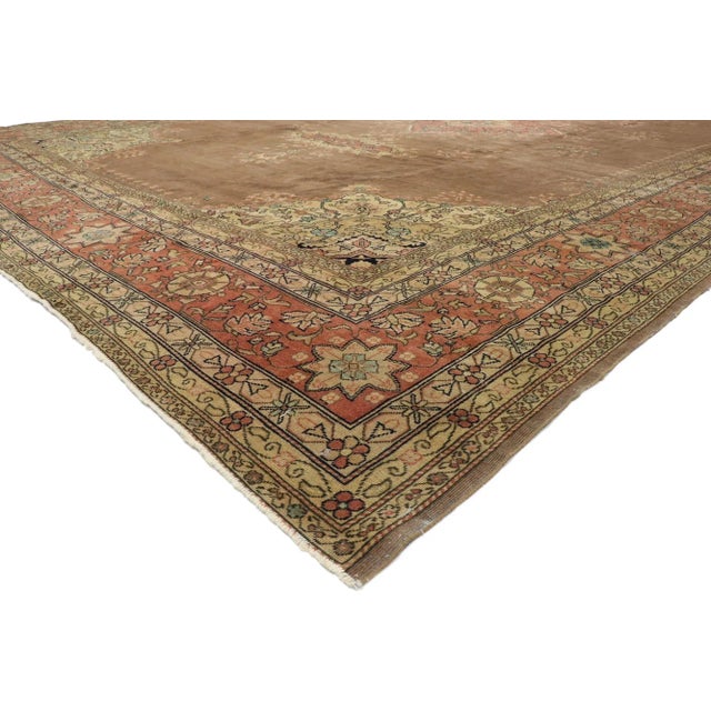 72650 Antique Romanian Hotel Lobby Size Rug with Rustic Victorian Style 13'00 x 19'09. Warm and inviting with Old World...